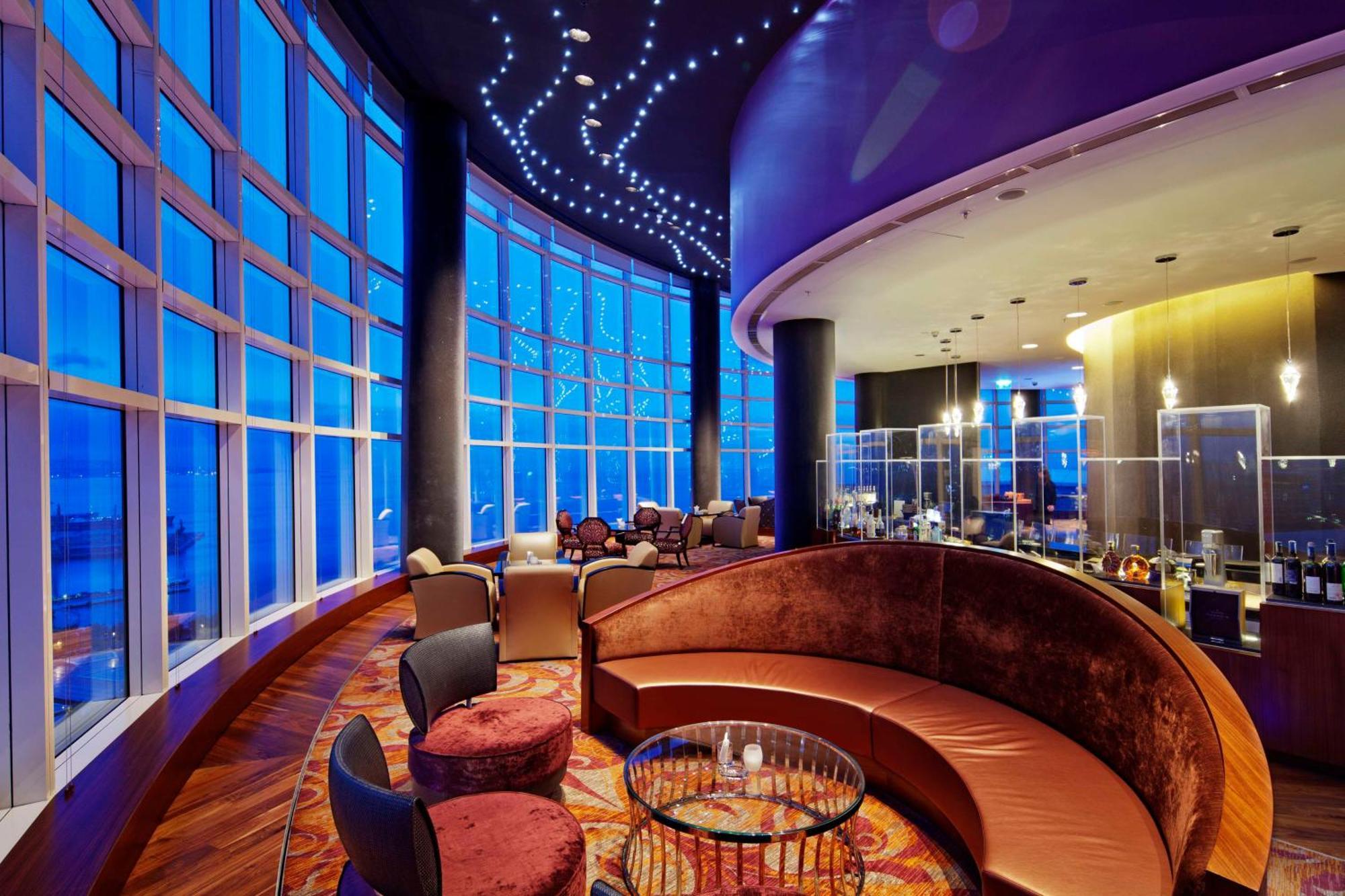 Hilton Baku Hotel Exterior photo The 87th Lounge at Hong Kong International Airport